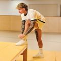 Tričko Oversized Varsity White - GymBeam, veľkosť S