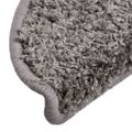 vidaXL Schodové rohože 30 ks 56x17x3 cm sivé, polkruhové