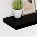 vidaXL Plávajúce nástenné police 4ks, lesklé čierne 120x23,5x3,8cm,MDF