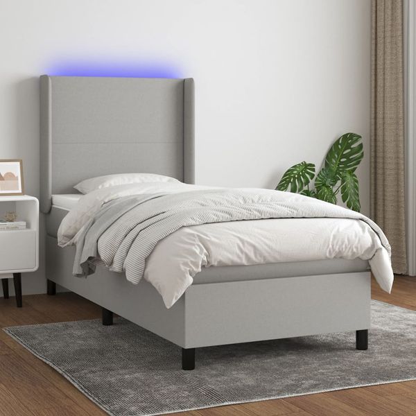 vidaXL Posteľ boxsping s matracom a LED bledosivá 90x200 cm látka