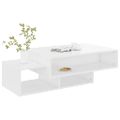 vidaXL Konferenčný stolík lesklý biely 105x55x32 cm kompozitné drevo