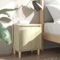 vidaXL Nočný stolík s nohami z masívneho dreva dub sonoma 40x30x50 cm