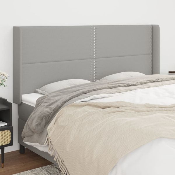 vidaXL Čelo postele so záhybmi bledosivé 163x16x118/128 cm látka