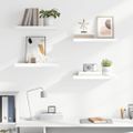 vidaXL Plávajúce nástenné police 4 ks, lesklé biele 50x23,5x3,8 cm, MDF