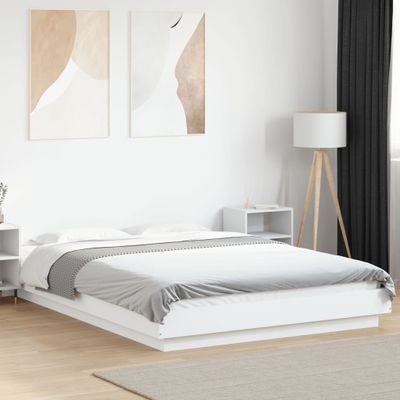 vidaXL Posteľný rám s LED svetlami biely 140x190 cm kompoz. drevo