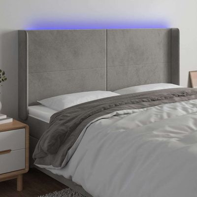 vidaXL Čelo postele s LED bledosivé 183x16x118/128 cm zamat