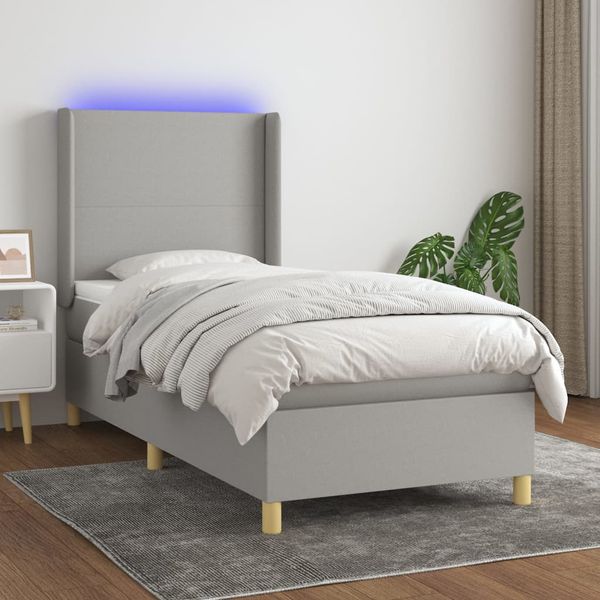 vidaXL Posteľ boxsping s matracom a LED bledosivá 90x190 cm látka