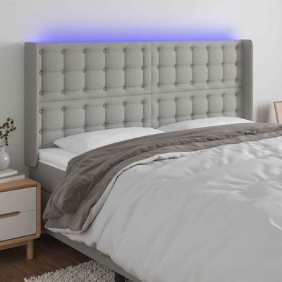 vidaXL Čelo postele s LED bledosivé 183x16x118/128 cm látka
