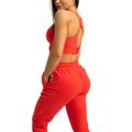 Dámske tepláky Limitless Hot Red - GymBeam, veľkosť XXL, veľkosť oblečenia XXL