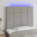 vidaXL Čelo postele s LED bledosivé 100x7x118/128 cm látka