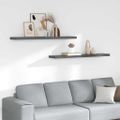 vidaXL Plávajúce nástenné police 2 ks, lesklé sivé 120x23,5x3,8cm, MDF