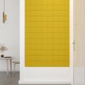 vidaXL Nástenné panely 12 ks žlté 60x15 cm zamat 1,08 m²