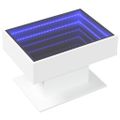 vidaXL Konferenčný stolík s LED biely 70x50x45 cm kompozitné drevo