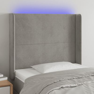 vidaXL Čelo postele s LED bledosivé 83x16x118/128 cm zamat