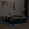 vidaXL Posteľný rám s LED svetlami čierny 140x190 cm kompoz. drevo