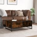 vidaXL Konferenčný stolík dymový dub 90x57x35 cm kompozit. drevo a kov