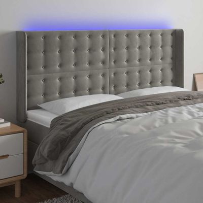 vidaXL Čelo postele s LED bledosivé 183x16x118/128 cm zamat