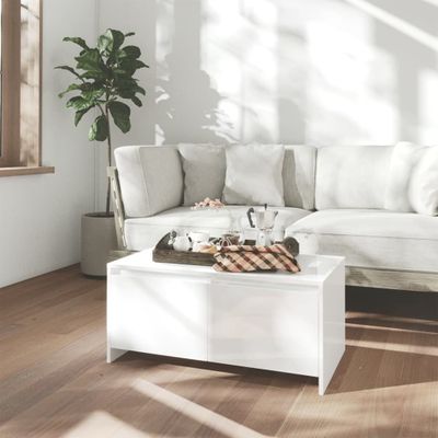 vidaXL Konferenčný stolík, lesklý biely 90x50x41,5cm, kompozitné drevo