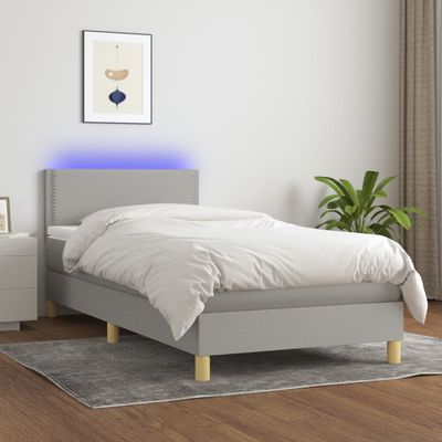 vidaXL Posteľ boxsping s matracom a LED bledosivá 90x190 cm látka