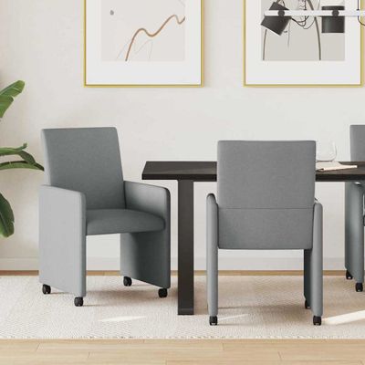 vidaXL Jedálenské stoličky na kolieskach 2 pcs Svetlosivá látka
