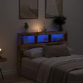 vidaXL Skrinka na čelo postele s LED staré drveo 140x17x102 cm