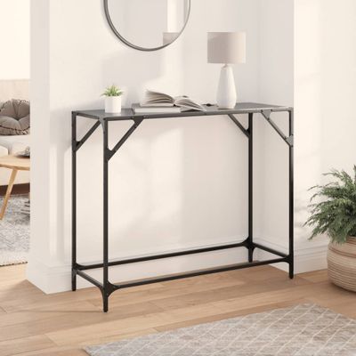 vidaXL Konzolový stolík s čiernou sklenenou doskou 98x35x81 cm oceľ