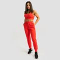 Dámske tepláky Limitless Hot Red - GymBeam, veľkosť XXL, veľkosť oblečenia XXL