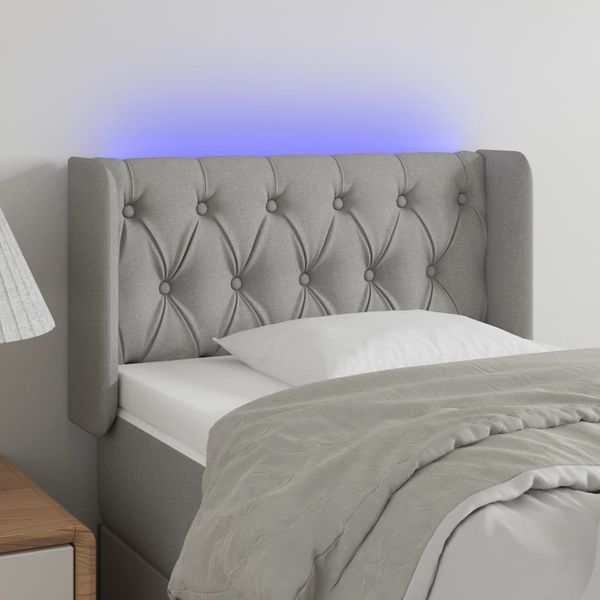 vidaXL Čelo postele s LED bledosivé 83x16x78/88 cm látka