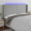 vidaXL Čelo postele s LED bledosivé 163x16x118/128 cm látka