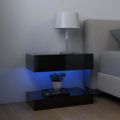 vidaXL TV skrinka s LED svetlami lesklá čierna 60x35 cm