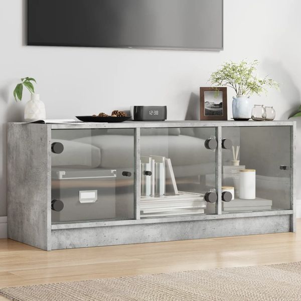 vidaXL TV skrinka so sklenenými dvierkami betónovo sivá 102x37x42 cm