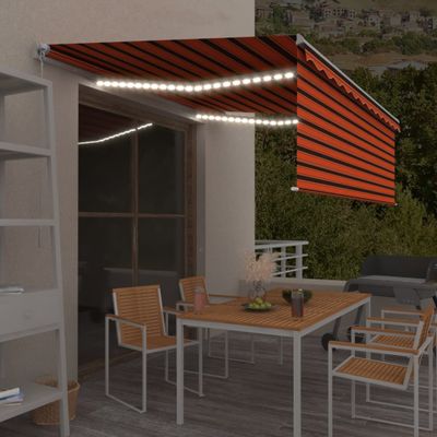 vidaXL Ručne zaťahovacia markíza s tienidlom&LED 4,5x3m oranžovo-hnedá