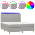 vidaXL Posteľ boxsping s matracom a LED bledosivá 160x200 cm látka