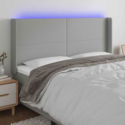 vidaXL Čelo postele s LED bledosivé 183x16x118/128 cm látka