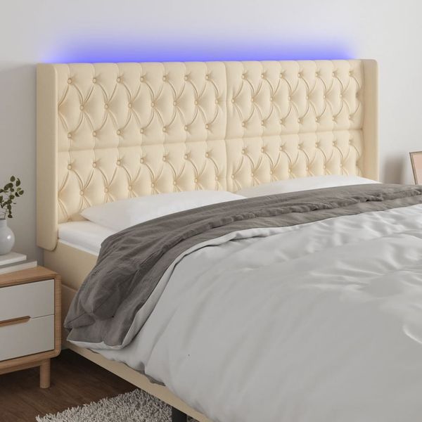 vidaXL Čelo postele s LED krémové 203x16x118/128 cm látka