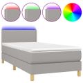 vidaXL Posteľ boxsping s matracom a LED bledosivá 90x200 cm látka