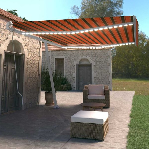 vidaXL Ručne zaťahovacia markíza s LED 500x350 cm oranžová a hnedá