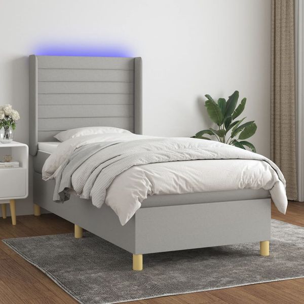 vidaXL Posteľ boxsping s matracom a LED bledosivá 90x200 cm látka