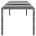 vidaXL Záhradný stôl 250x100x75 cm tvrdené sklo a polyratan sivý