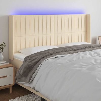 vidaXL Čelo postele s LED krémové 163x16x118/128 cm látka