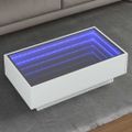 vidaXL Konferenčný stolík s LED biely 90x50x30 cm kompozitné drevo