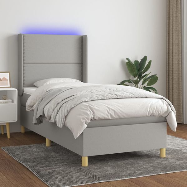 vidaXL Posteľ boxsping s matracom a LED bledosivá 90x200 cm látka