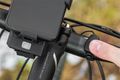 KRUGER & MATZ XT50 Držiak telefónu na bicykel 4v1 so svietidlom a powerbankou