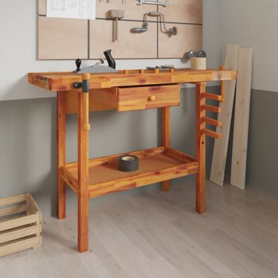 vidaXL Pracovný stôl so zásuvkou a zverákom 124x52x83 cm masívne drevo akácia