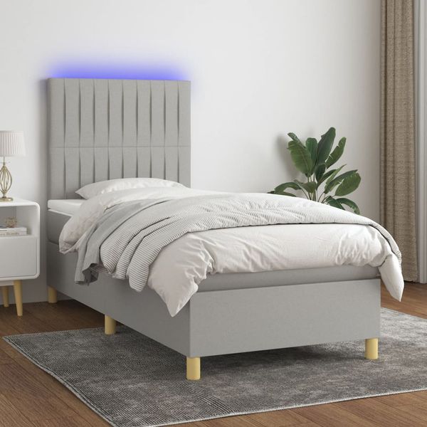 vidaXL Posteľ boxsping s matracom a LED bledosivá 90x190 cm látka
