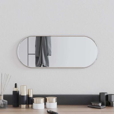 vidaXL Nástenné zrkadlo strieborné 50x20 cm oválne