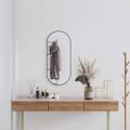 vidaXL Nástenné zrkadlo čierne 80x35 cm okrúhle