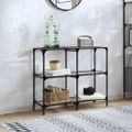 vidaXL Konzolový stolík priehľadná sklenená doska 98x30x81 cm oceľ