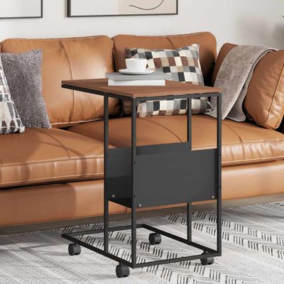 vidaXL Príručný stolík s kolieskami čierny 55x36x63,5cm spracov. drevo