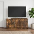 vidaXL TV skrinka Dymový dub 99 x 34,5 x 47 cm Kompozitné drevo